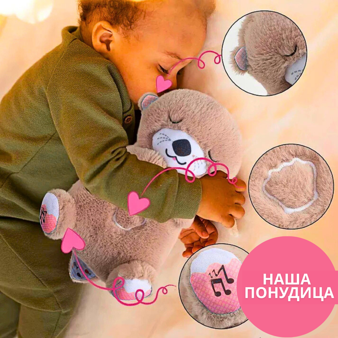 Meda koji spava diše svetli i svira uspavanke