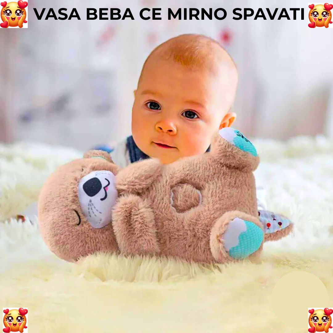 Meda koji spava diše svetli i svira uspavanke